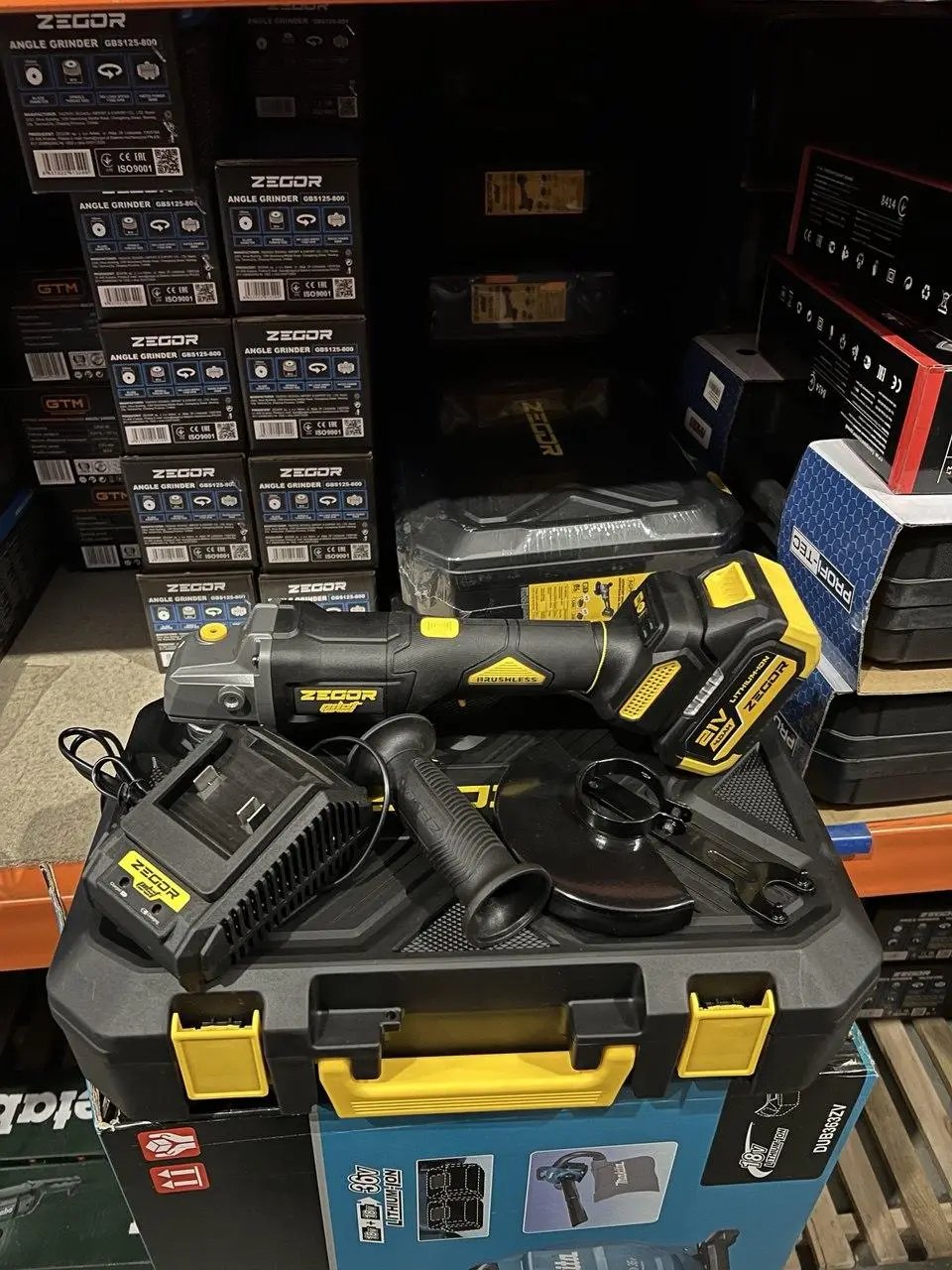 ФОТО КАРТИНКИ ЗОБРАЖЕННЯ Кутова безщіткова шліфмашина ZEGOR AGPP-21BL-125 (акум 21V 4.0Ah 1шт і зарядка) РОЗДРІБ ОПТ ГУРТ ГУРТОМ ОПТОМ! З ЄВРОПИ! ЯКІСТЬ! Купити Львів Характеристики Ціна Оплата Доставка "БОГОДАР" ІНТЕРНЕТ-МАГАЗИН Огляд Рейтинг Порівняння Як вибрати Якісний
