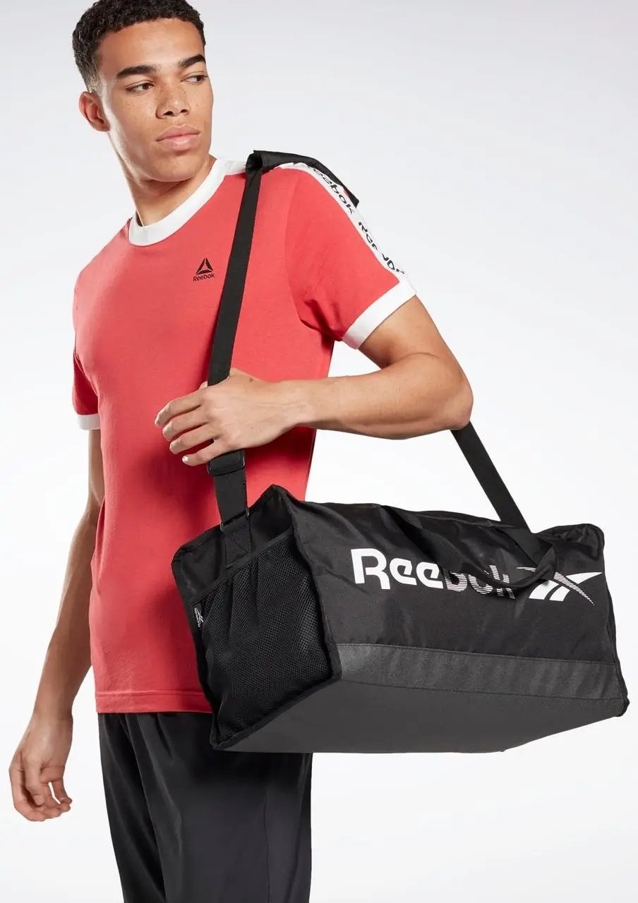 ФОТО КАРТИНКИ ЗОБРАЖЕННЯ Спортивна сумка 35L REEBOK TRAINING ESSENTIALS MEDIUM чорна FL5135 black РОЗДРІБ ОПТ ГУРТ ГУРТОМ ОПТОМ! З ЄВРОПИ! ЯКІСТЬ! Купити Львів Характеристики Ціна Оплата Доставка "БОГОДАР" ІНТЕРНЕТ-МАГАЗИН Огляд Рейтинг Порівняння Як вибрати Якісний
